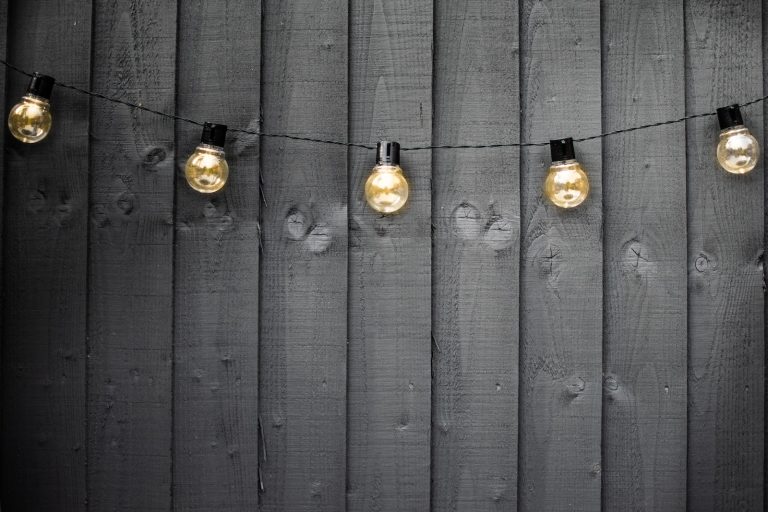 garden fence lighting ideas, brown wooden door with brown door knob